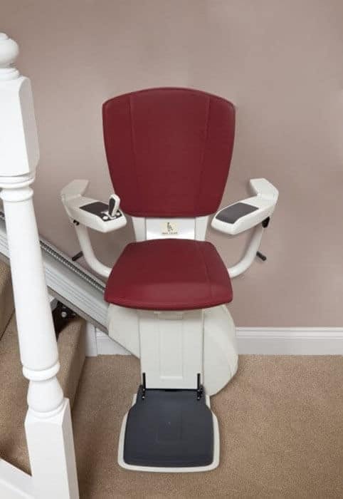 HomeGlide Extra ThyssenKrupp Straight Stairlift from 1st Choice Stairlifts in red upholstery
